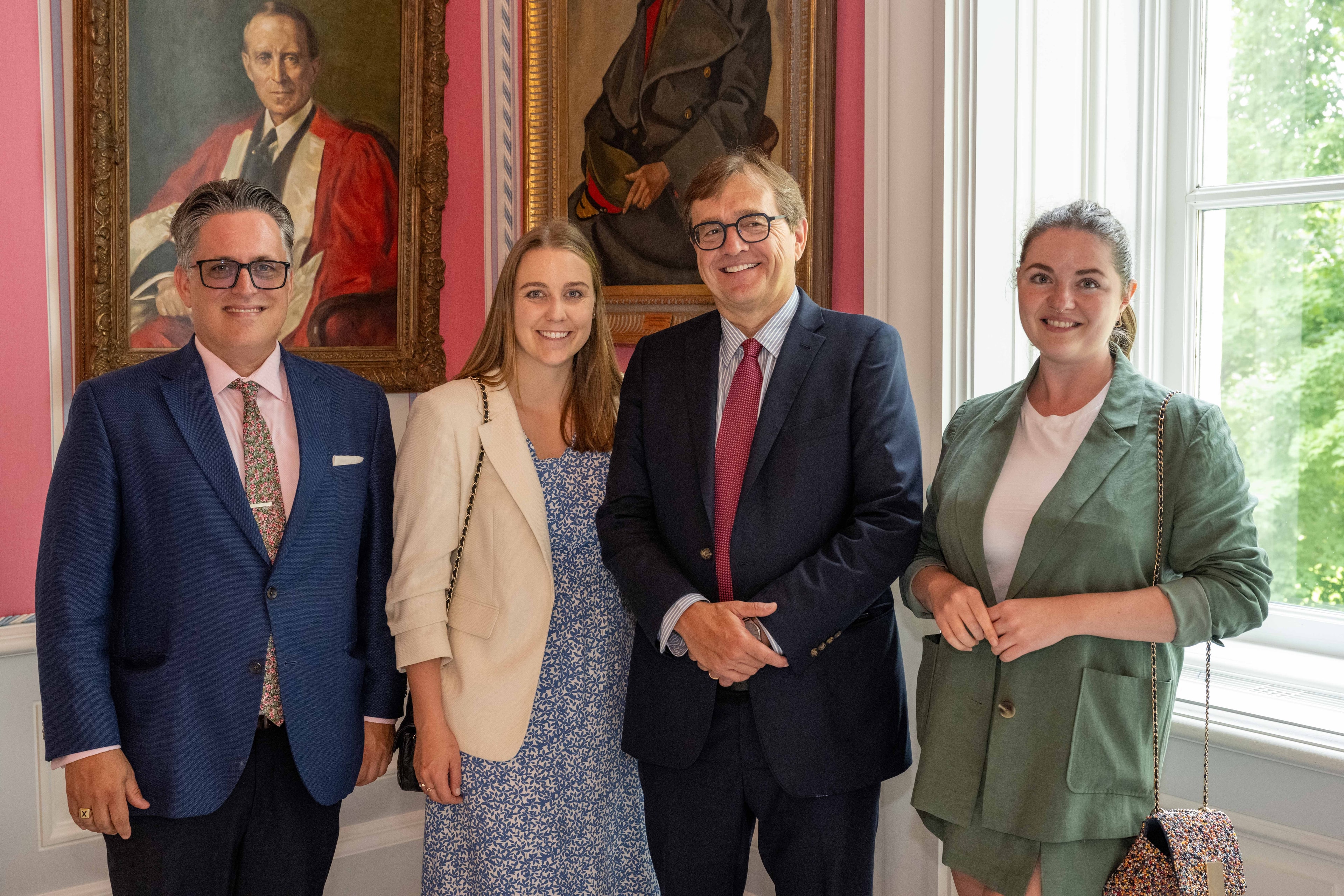 Claire at a formal reception with colleagues