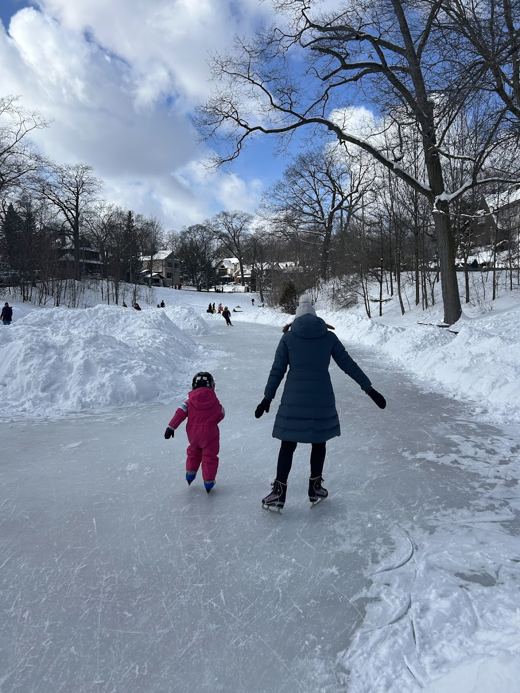 Claire skating with her child